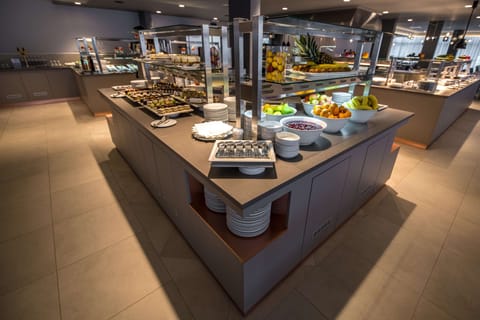 Breakfast, lunch, dinner served; international cuisine, pool views 