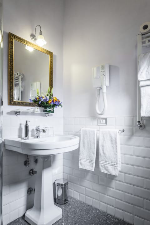 Shower, rainfall showerhead, eco-friendly toiletries, hair dryer