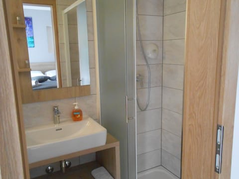 Double Room, Balcony | Bathroom | Shower, free toiletries, hair dryer, towels