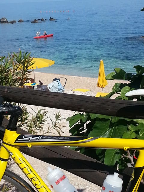 On the beach, sun loungers, beach umbrellas, beach towels