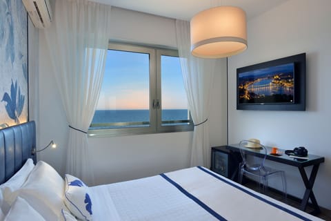 Superior Double Room Single Use, Private Bathroom, Sea View | Minibar, in-room safe, individually decorated, desk