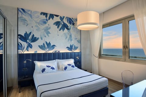 Superior Double Room Single Use, Private Bathroom, Sea View | Minibar, in-room safe, individually decorated, desk