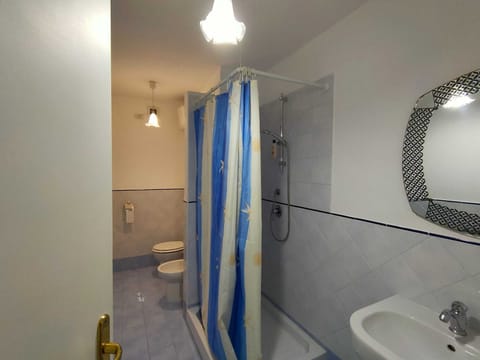 Double Room, Patio, No View | Bathroom | Shower, hair dryer, bidet, towels