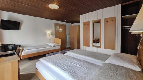 Standard Triple Room | Premium bedding, memory foam beds, in-room safe, desk