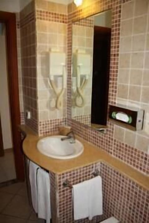 Shower, designer toiletries, hair dryer, bidet