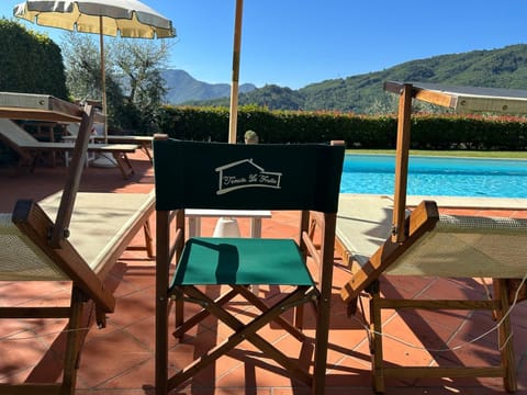 Seasonal outdoor pool, pool umbrellas, sun loungers