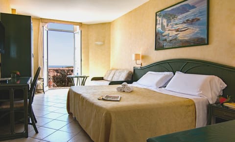 Double or Twin Room, Partial Sea View | In-room safe, blackout drapes, soundproofing, free WiFi