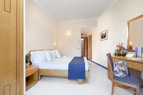 Standard Double Room | Desk, iron/ironing board, cribs/infant beds, rollaway beds