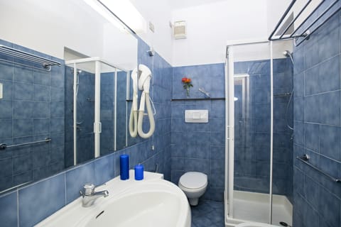 Economy Double Room, 1 Double Bed | Bathroom | Free toiletries, hair dryer, towels