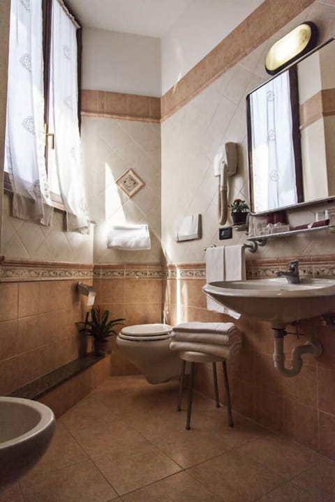 Triple Room | Bathroom | Shower, free toiletries, hair dryer, bathrobes