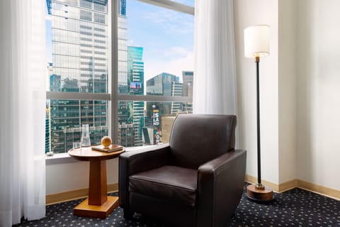 Suite, 1 King Bed (Millennium) | In-room safe, desk, laptop workspace, blackout drapes