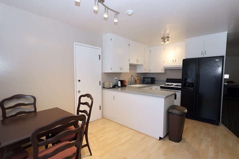 Suite, 2 Queen Beds, Non Smoking, Kitchen (Separate Living Room) | Desk, laptop workspace, iron/ironing board, WiFi