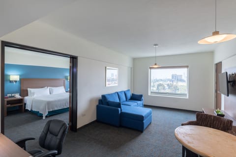 Suite, 1 Bedroom | In-room safe, desk, blackout drapes, iron/ironing board