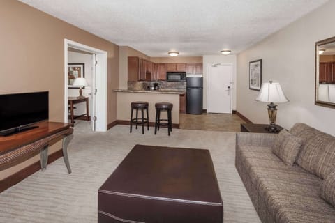 Suite, 1 King Bed (Extended) | Living area | 43-inch TV with cable channels, foosball