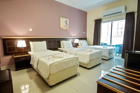 Standard Triple Room, 3 Bedrooms | Pillowtop beds, minibar, iron/ironing board, free WiFi