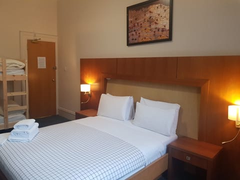 Quadruple Room | Blackout drapes, iron/ironing board, free WiFi, bed sheets