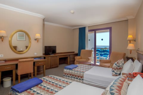 Standard Double or Twin Room, Partial Sea View | Free minibar items, in-room safe, desk, WiFi