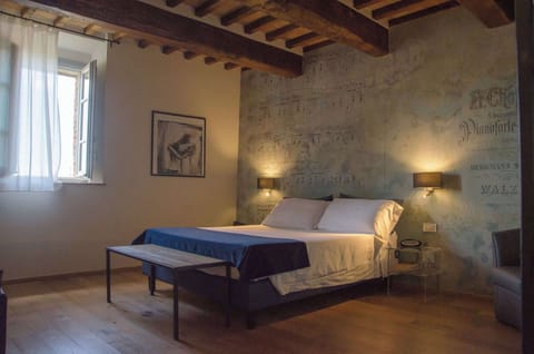 Deluxe Room, Multiple Beds, Non Smoking | In-room safe, individually decorated, desk, blackout drapes