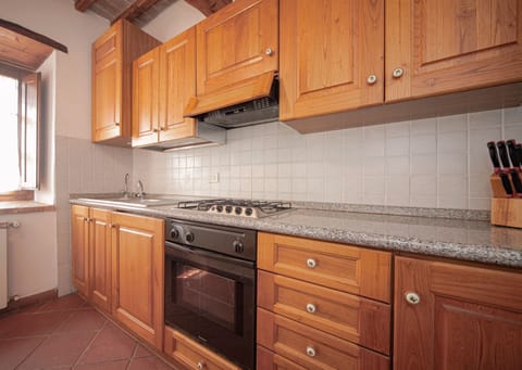 Apartment, 2 Bedrooms, Garden View (La Quercia ) | Private kitchen | Full-size fridge, oven, stovetop, cookware/dishes/utensils