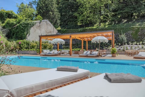 Seasonal outdoor pool, pool umbrellas, sun loungers