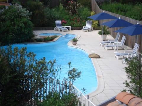 Outdoor pool, open 9 AM to 7 PM, sun loungers