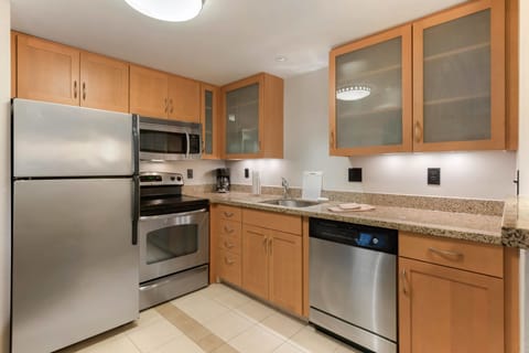 Suite, 2 Bedrooms | Private kitchen | Full-size fridge, microwave, stovetop, dishwasher