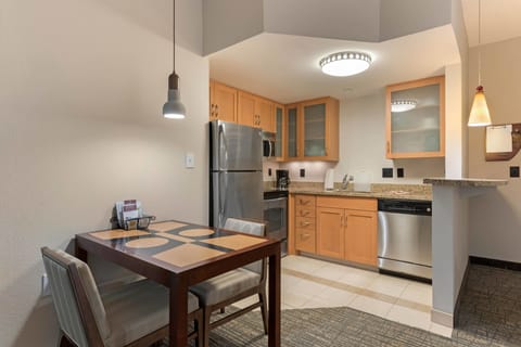 Suite, 1 Bedroom | Private kitchen | Full-size fridge, microwave, stovetop, dishwasher