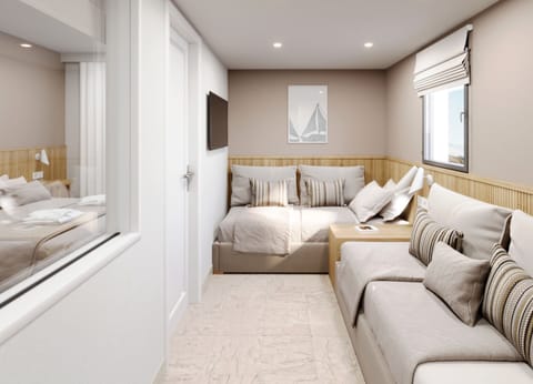Family Room, Garden View | Free minibar, in-room safe, desk, blackout drapes