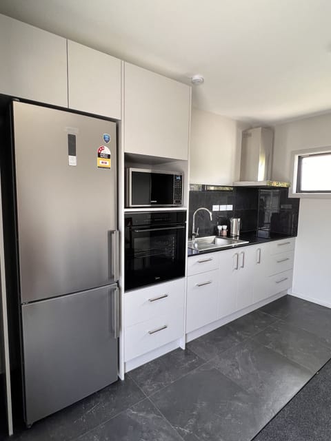 Deluxe Apartment | Private kitchen | Fridge, coffee/tea maker