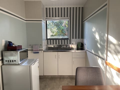 Studio Room | Private kitchen | Fridge, microwave, electric kettle, toaster