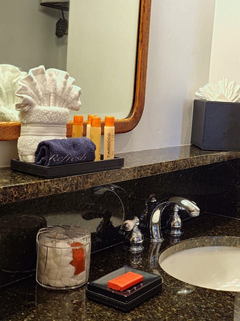 Cottage Suite 51 | Bathroom | Deep soaking tub, designer toiletries, hair dryer, towels