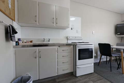 One bedroom Unit | Private kitchen | Fridge, microwave, coffee/tea maker, electric kettle