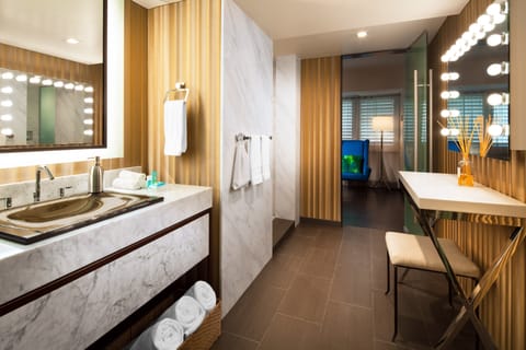 Shower, designer toiletries, hair dryer, bathrobes