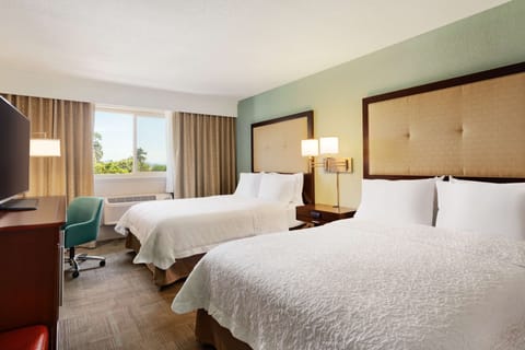 Standard Two Queen Beds | Desk, blackout drapes, iron/ironing board, free cribs/infant beds