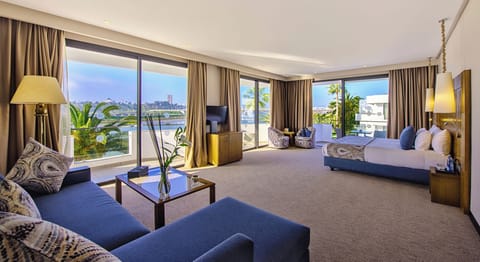 Premium Suite (River View) | Minibar, in-room safe, individually decorated, individually furnished