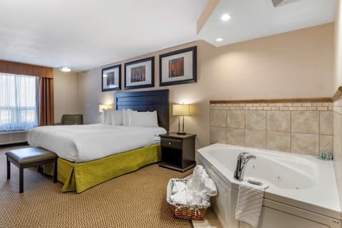 Suite, 1 King Bed, Non Smoking, Jetted Tub | Hypo-allergenic bedding, in-room safe, desk, laptop workspace