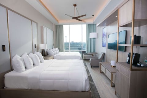 Desk, laptop workspace, iron/ironing board, free cribs/infant beds