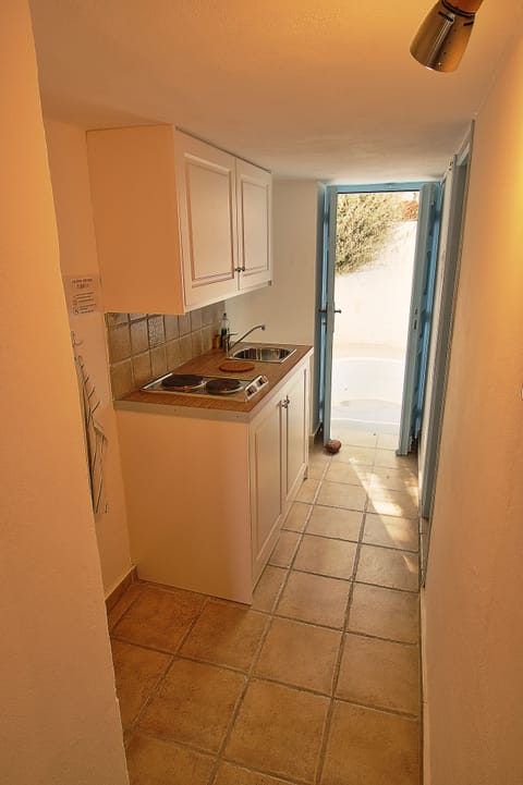 Traditional Apartment (Triple) | Private kitchen | Fridge, electric kettle