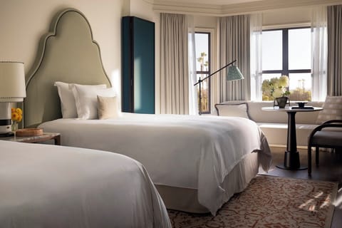 Premium bedding, down comforters, in-room safe, desk