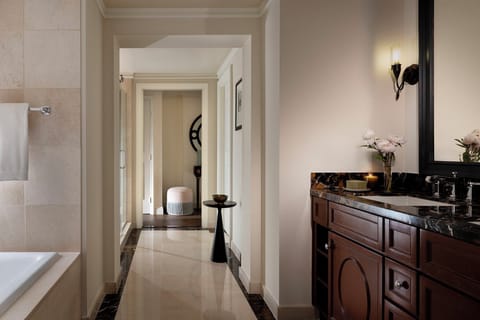 Combined shower/tub, designer toiletries, hair dryer, bathrobes