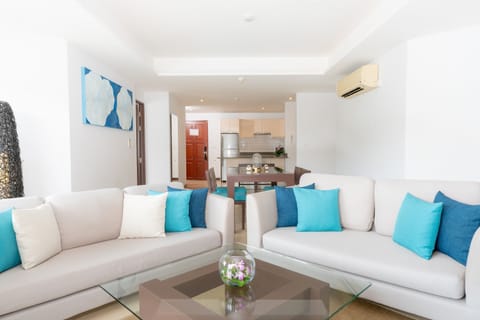 Premium Suite, 2 Bedrooms | Living area | 40-inch flat-screen TV with satellite channels, TV