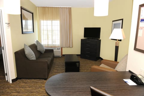 Suite, 1 Bedroom (1 Queen Bed) | Desk, blackout drapes, iron/ironing board, free cribs/infant beds