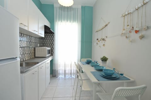 Apartment, 2 Bedrooms (4 Adults) | Private kitchenette | Fridge, stovetop, electric kettle, highchair