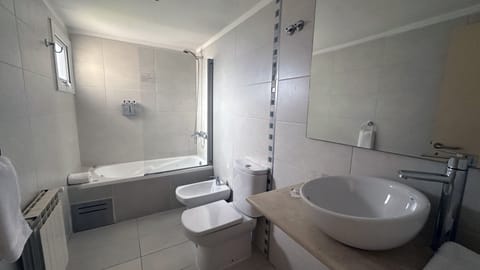 Junior Suite | Bathroom | Bathtub, deep soaking tub, eco-friendly toiletries, hair dryer