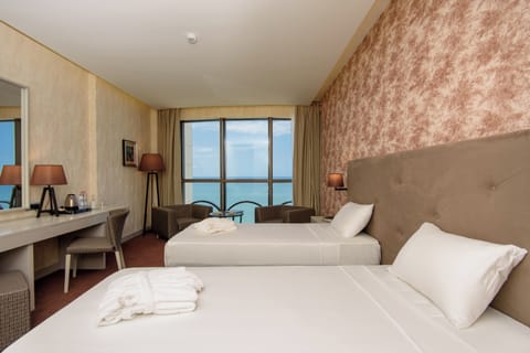 Standard Double Room, Sea View | Minibar, in-room safe, desk, soundproofing