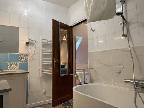 Deluxe Room (Andre Malraux) | Bathroom | Combined shower/tub, deep soaking tub, free toiletries, bathrobes