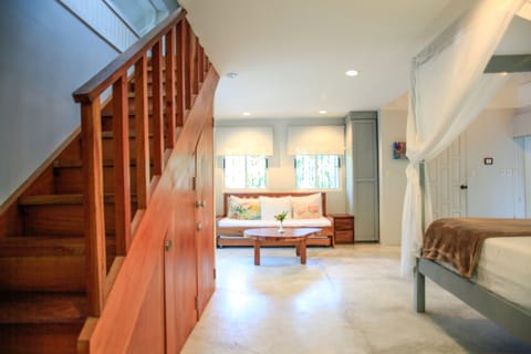 Deluxe Quadruple Room, Multiple Beds, Beachside (Casa Cassandra) | In-room safe, free WiFi, bed sheets