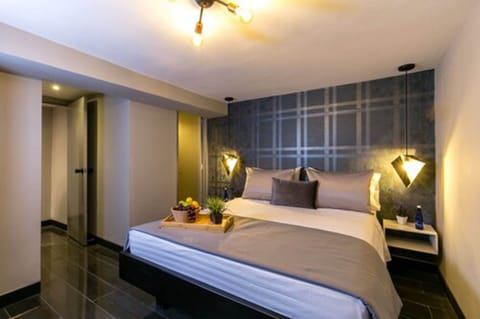 Basic Double Room | Minibar, in-room safe, individually decorated, individually furnished