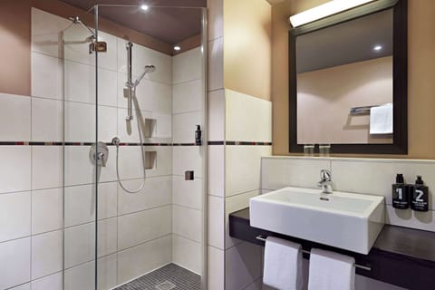 Deluxe Room, 2 Twin Beds | Bathroom | Shower, hair dryer, slippers, towels