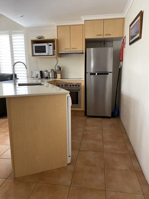 One Bedroom | Private kitchen | Fridge, microwave, oven, stovetop